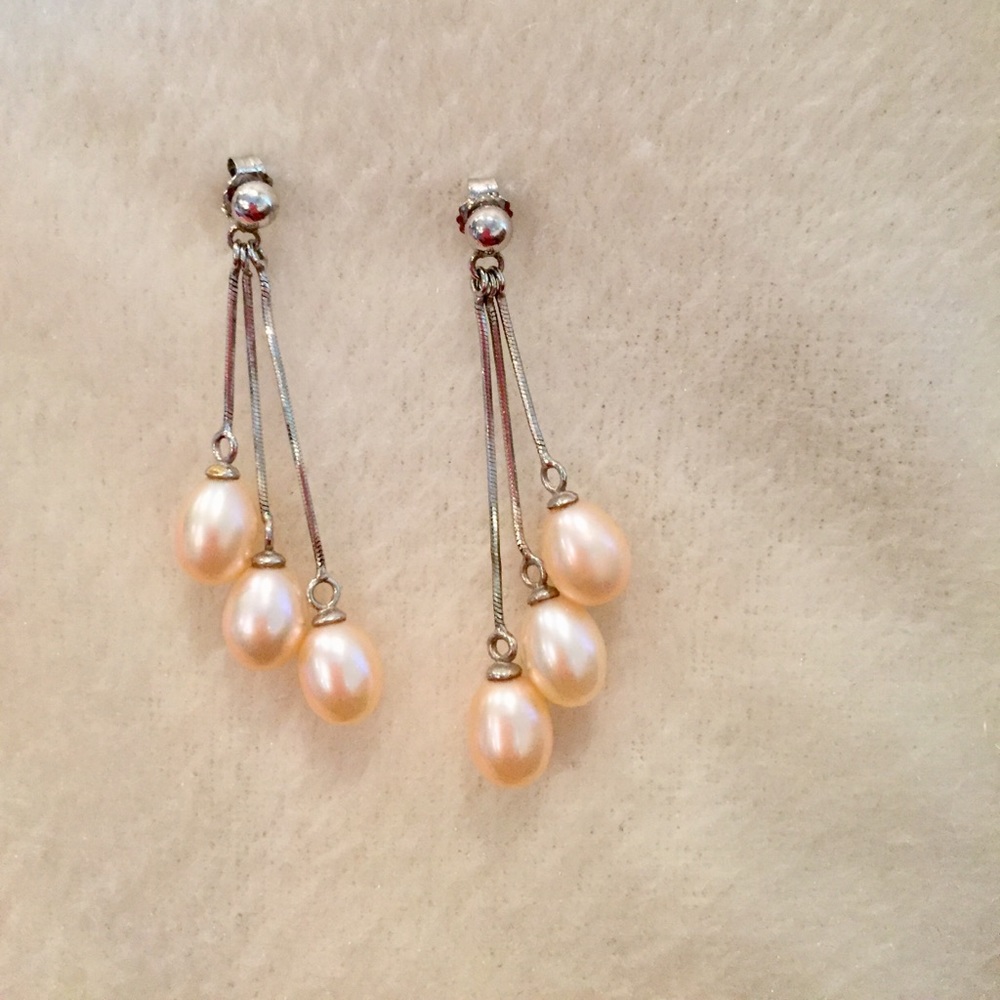 Freshwater pink pearl earrings.
